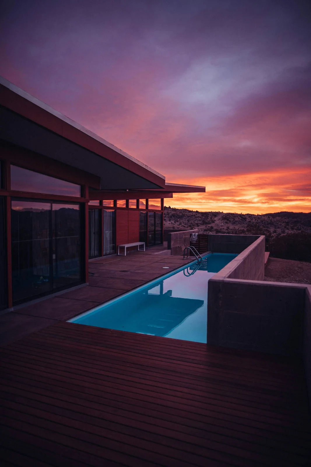 Luxury pool and home at sunset